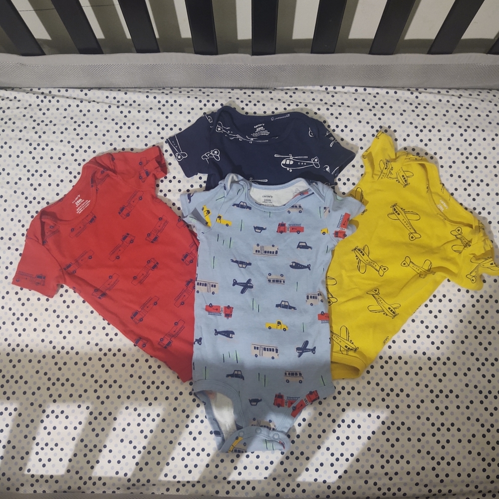 Carter's boys onesies 24 months - accepting offer.